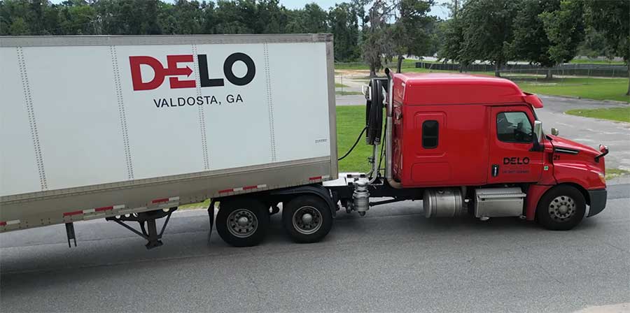 Company Truck fulfilling frieght brokerage commitment to deliver goods
