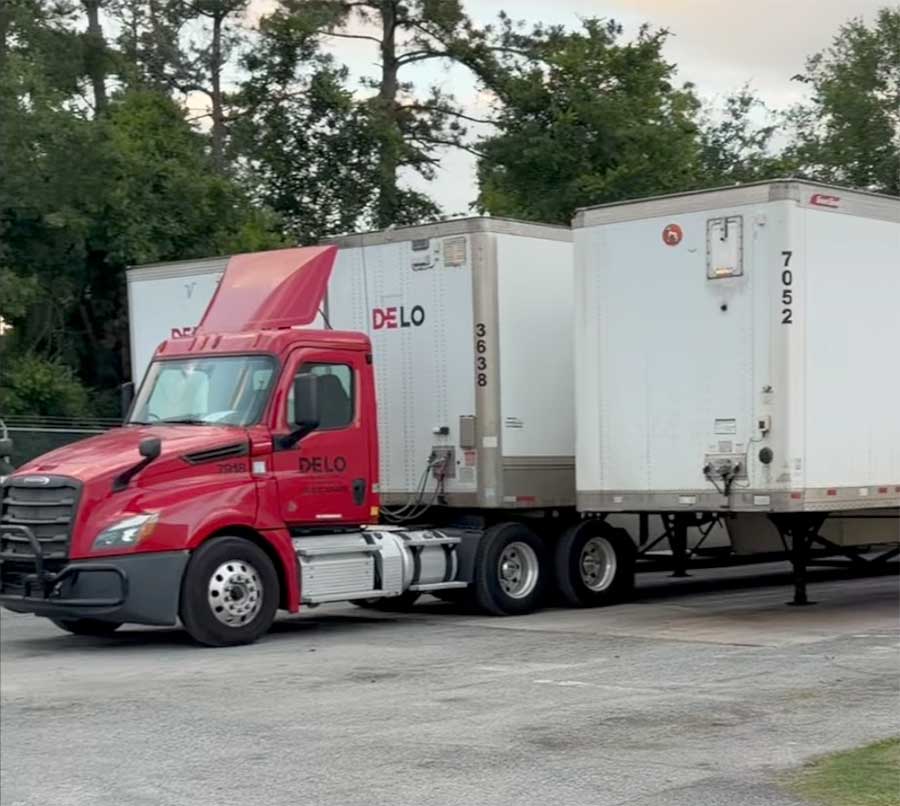 DeLo company semi waiting for a Load