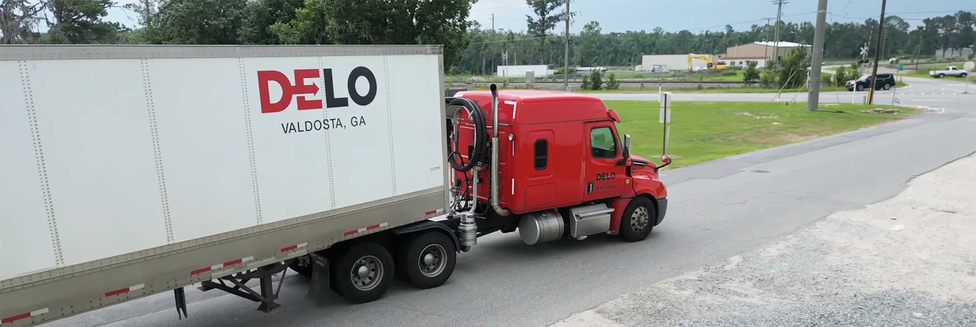 Interior Shot showing a DeLo truck leaving the warehouse with a load